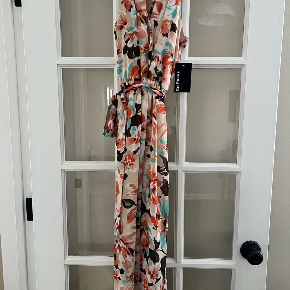 Size 4 floral pattern long sheath dress.